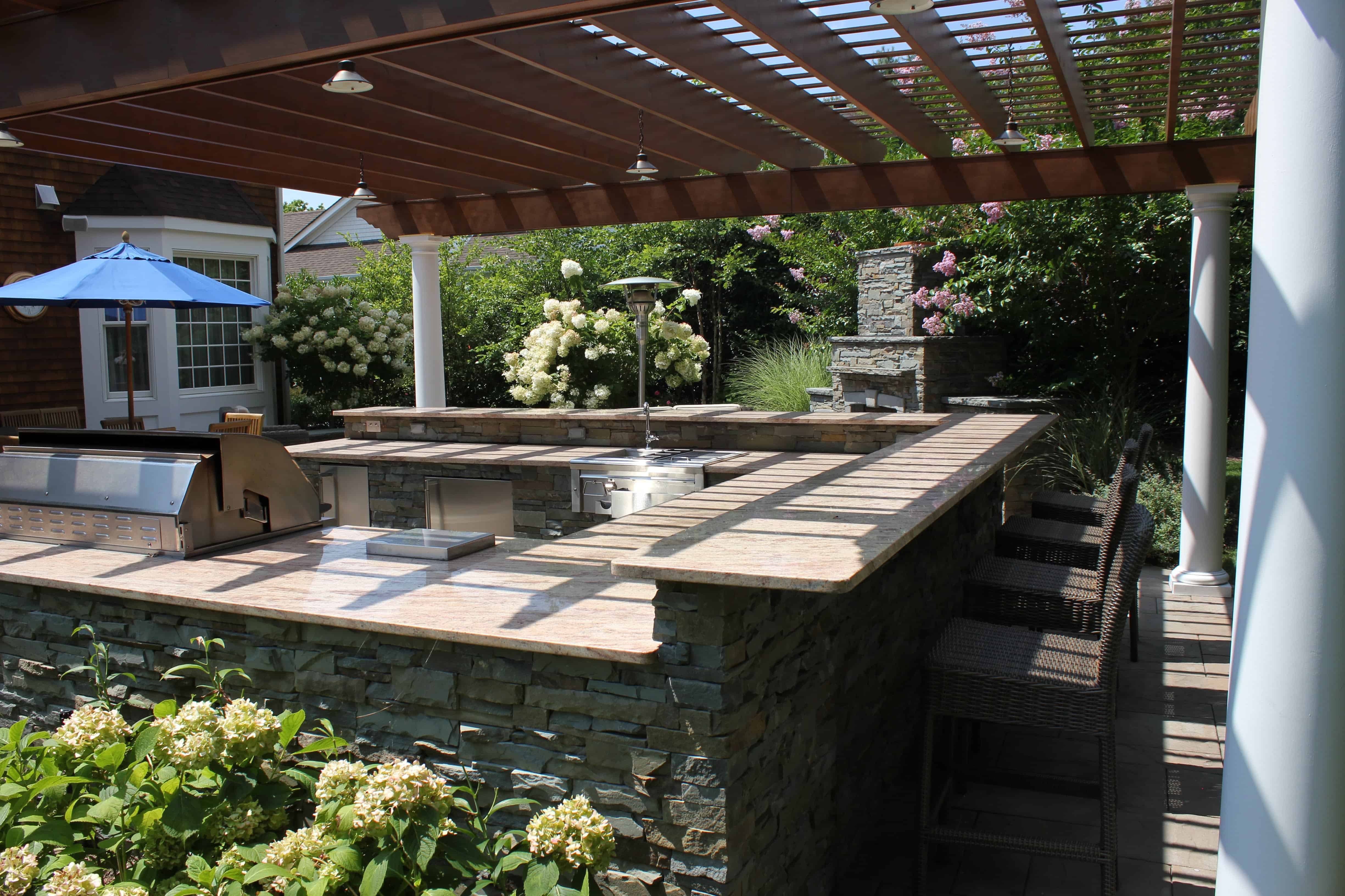 outdoor kitchen bar with pergola